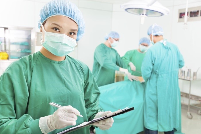 surgeons preping a patient