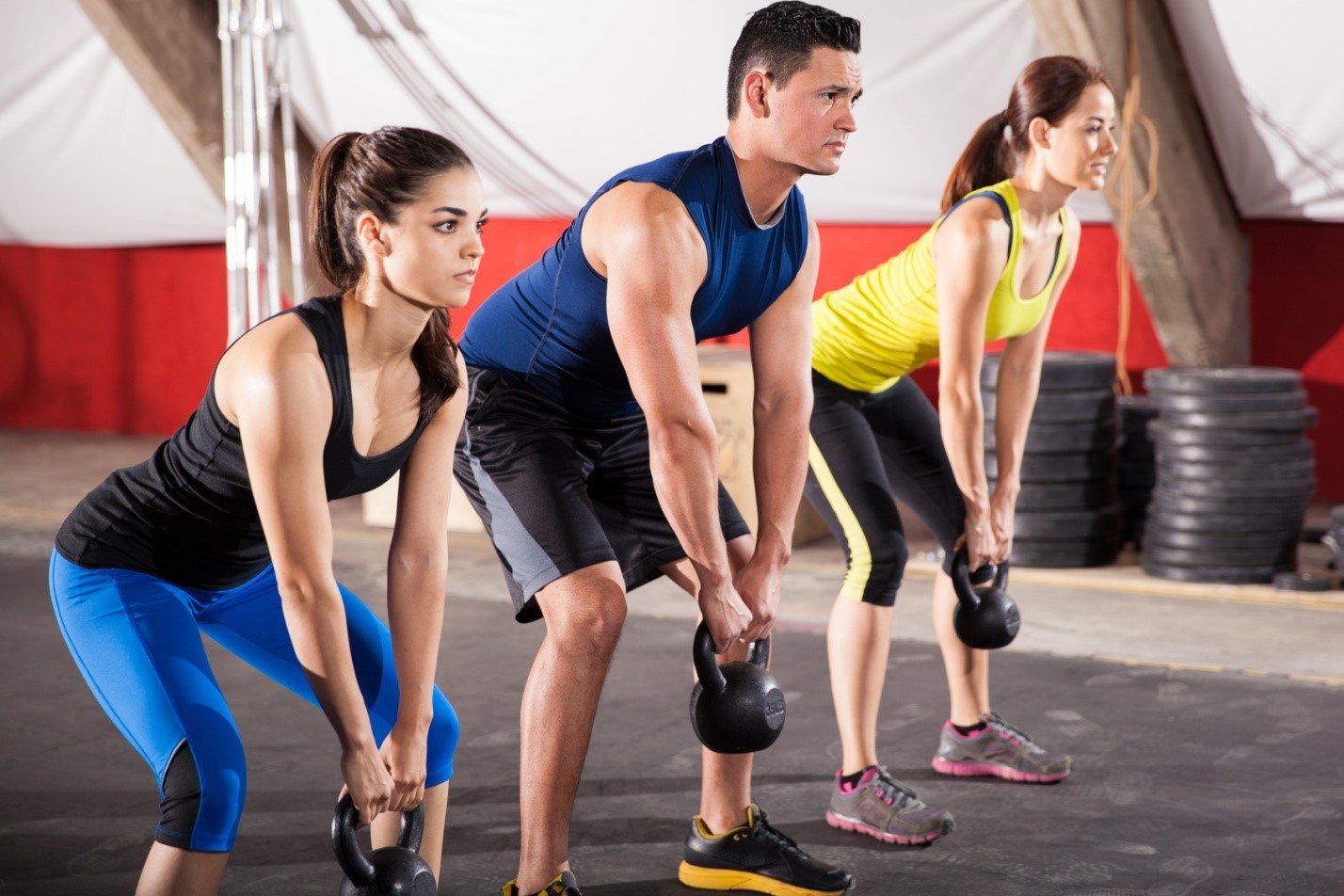 group squatting with weights