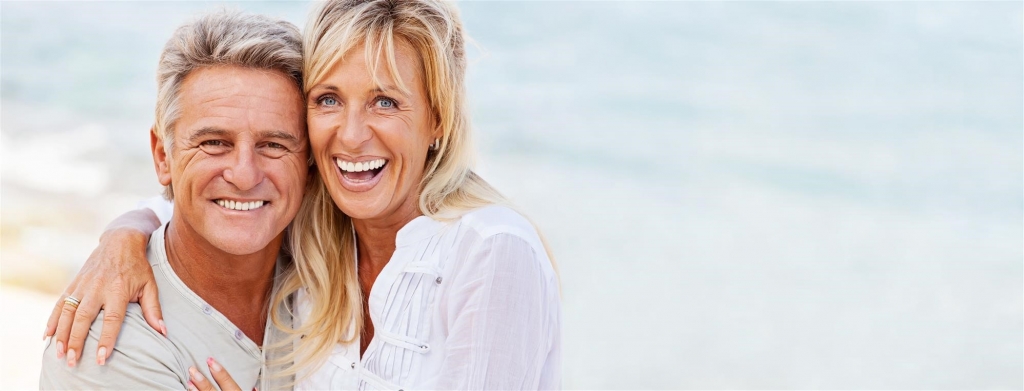 couple smiling at the beach