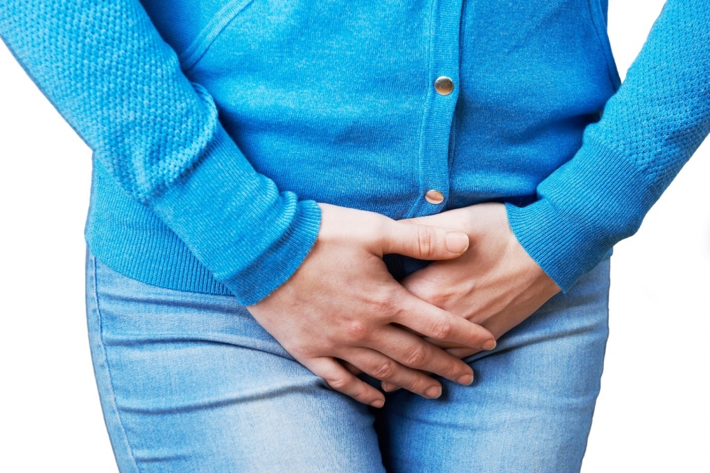 woman holding in her pee